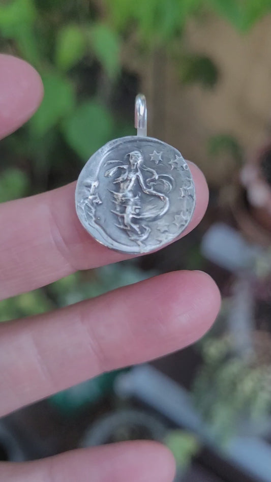 Moonlight dancing pendant. Sterling silver